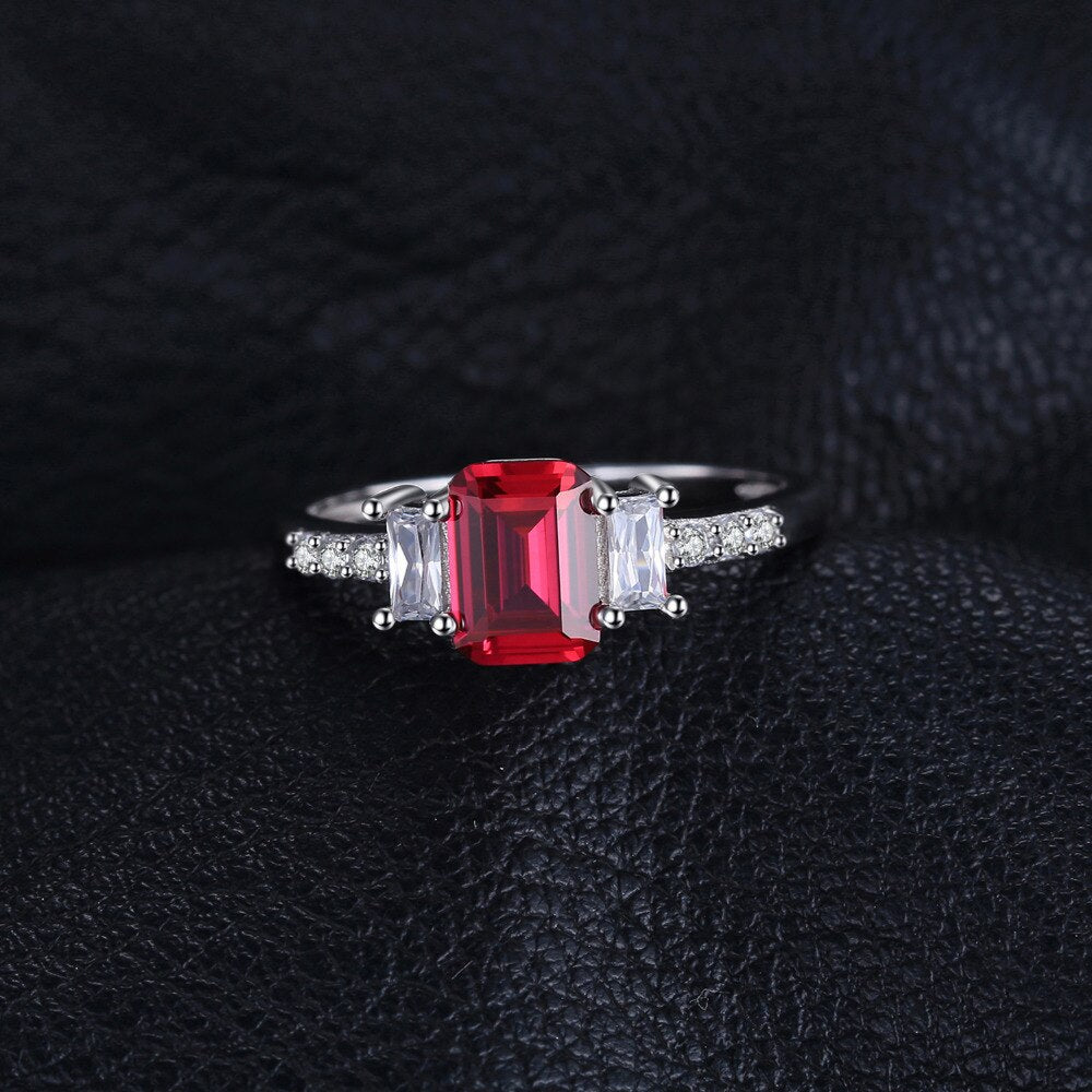 JewelryPalace 4.1ct Emerald Cut Created Ruby 925 Sterling Silver 3 Stone Ring for Women Fashion Gemstone Jewelry Birthday Gift