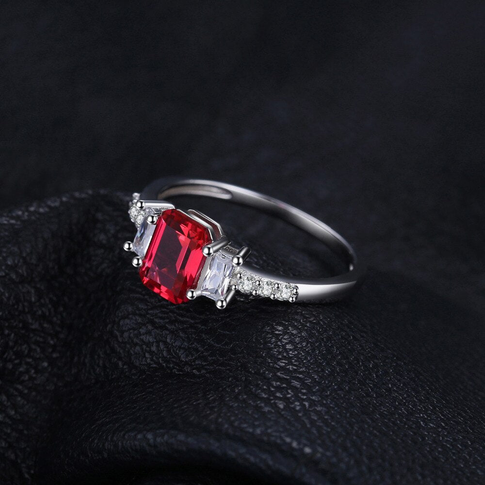 JewelryPalace 4.1ct Emerald Cut Created Ruby 925 Sterling Silver 3 Stone Ring for Women Fashion Gemstone Jewelry Birthday Gift