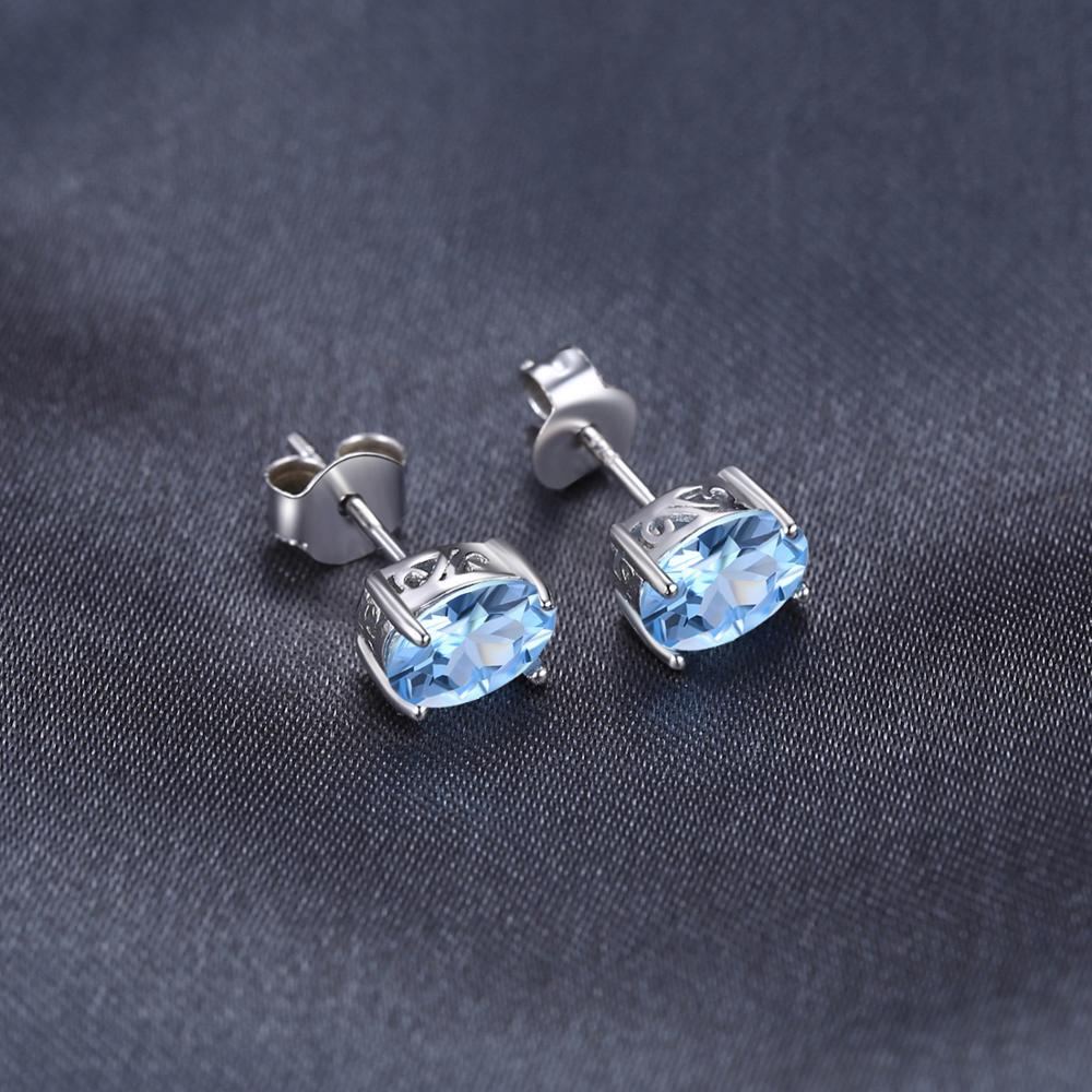 JewelryPalace Oval Genuine Natural Blue Topaz 925 Sterling Silver Stud Earrings for Women Fashion Statement Gemstone Jewelry