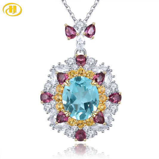Colgantes de topacio azul cielo natural de plata esterlina maciza de 10 quilates de citrino y granate rodolita genuino. Magníficas joyas finas.