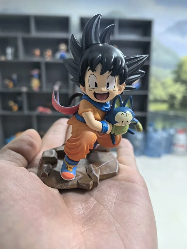 Dragon Ball Kawaii Figurine Childhood Son Goku Hold Puaru Action Figures Anime Model Doll Collection Desktop Decoration Toy About 9cm