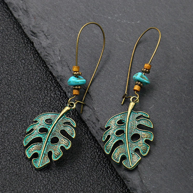 Vintage Palace Style Dangle Earrings for Women Boho Ethnic Creative Hollow Leaf Round Sun Hand Water Drop Earring Female Jewelry 8607