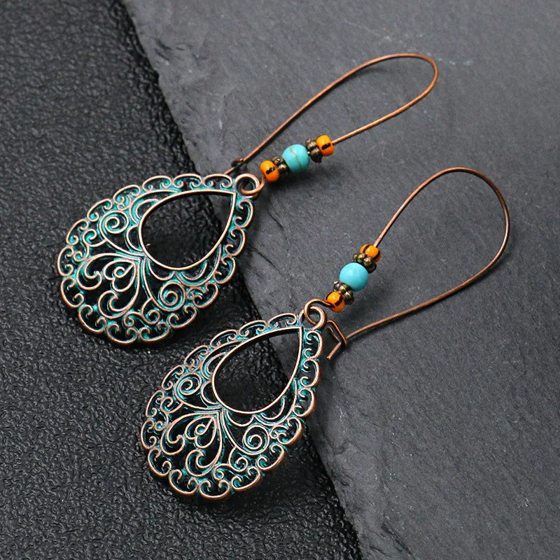 Vintage Palace Style Dangle Earrings for Women Boho Ethnic Creative Hollow Leaf Round Sun Hand Water Drop Earring Female Jewelry 1110
