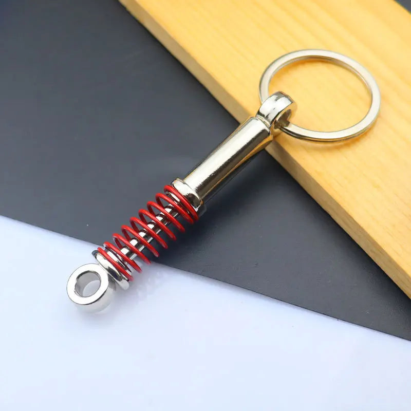 Mini Zinc Alloy Auto Parts Keychains Simulated Speed Gearbox Absorber Motor Piston Pendant Car Keys Holder Keyring Cute Men Gift JZ red 8 cm