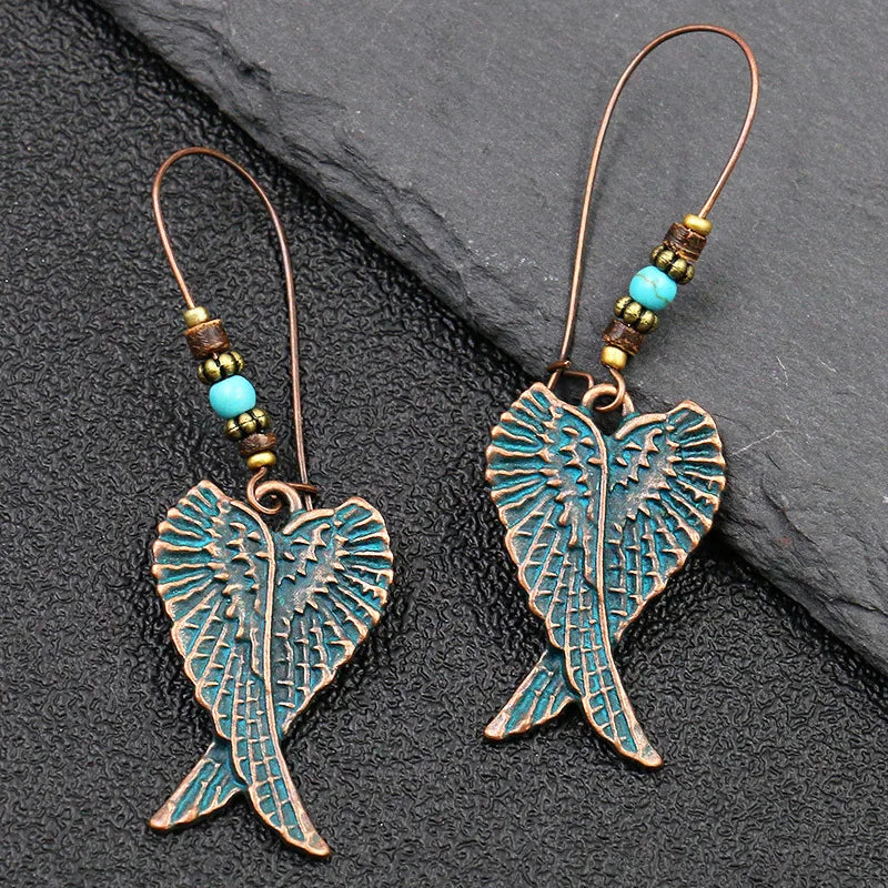 Vintage Palace Style Dangle Earrings for Women Boho Ethnic Creative Hollow Leaf Round Sun Hand Water Drop Earring Female Jewelry 1142