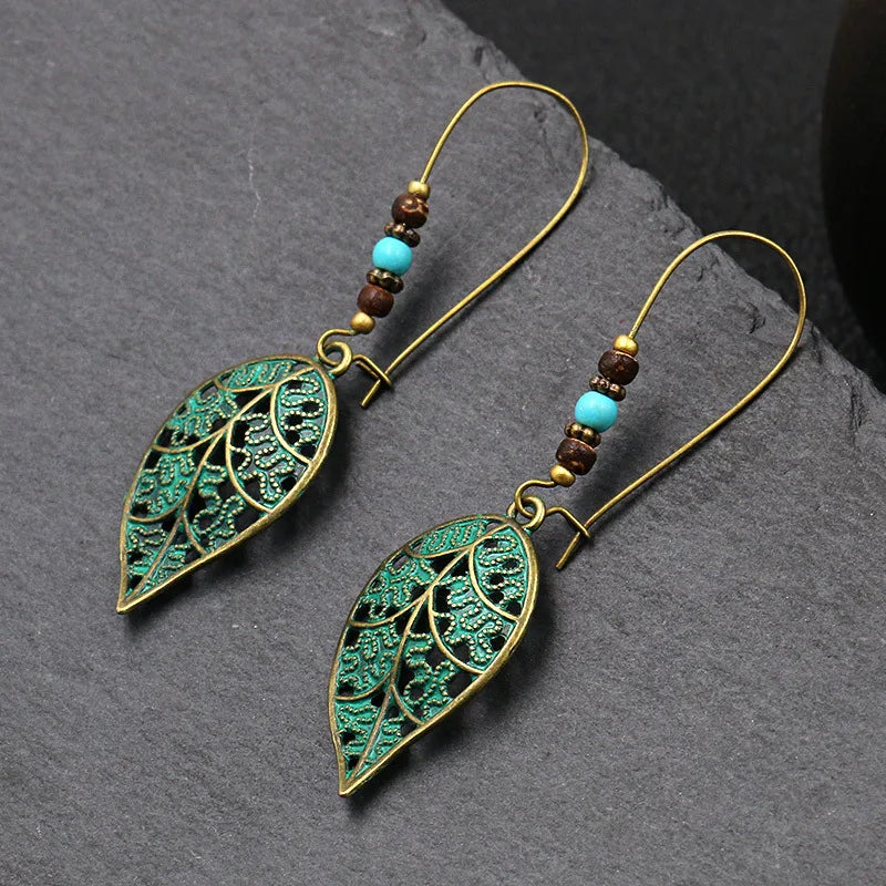 Vintage Palace Style Dangle Earrings for Women Boho Ethnic Creative Hollow Leaf Round Sun Hand Water Drop Earring Female Jewelry 1145