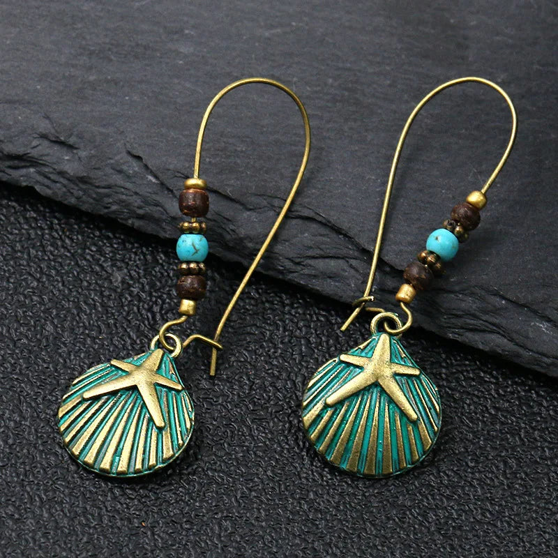 Vintage Palace Style Dangle Earrings for Women Boho Ethnic Creative Hollow Leaf Round Sun Hand Water Drop Earring Female Jewelry 1097