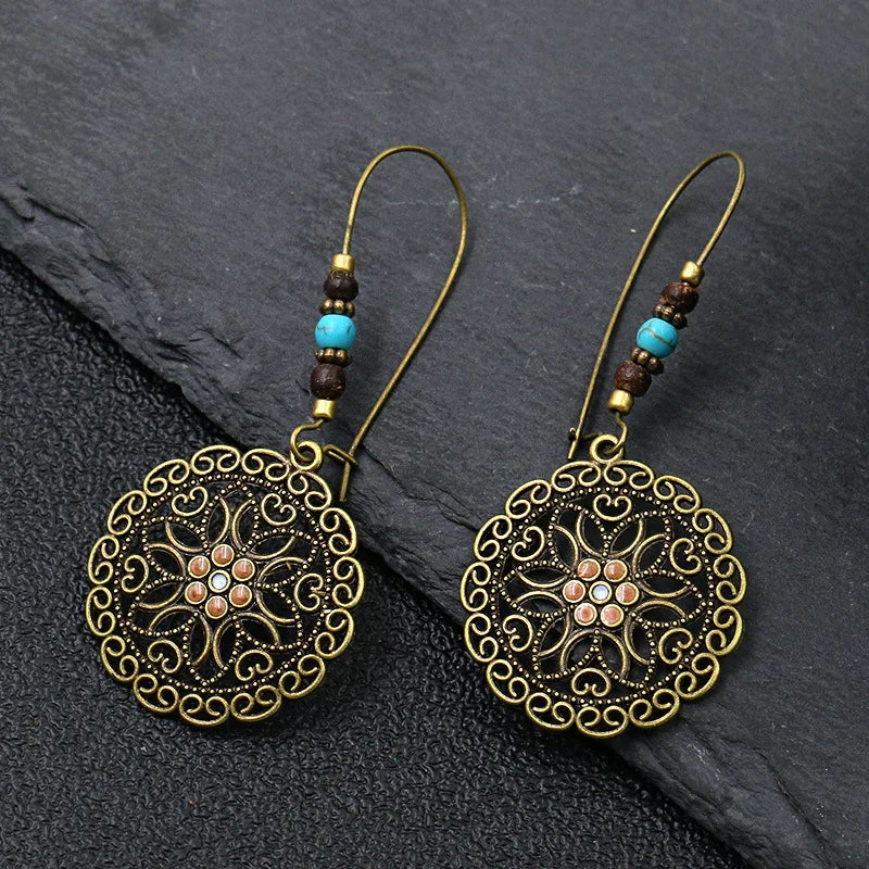 Vintage Palace Style Dangle Earrings for Women Boho Ethnic Creative Hollow Leaf Round Sun Hand Water Drop Earring Female Jewelry 1128