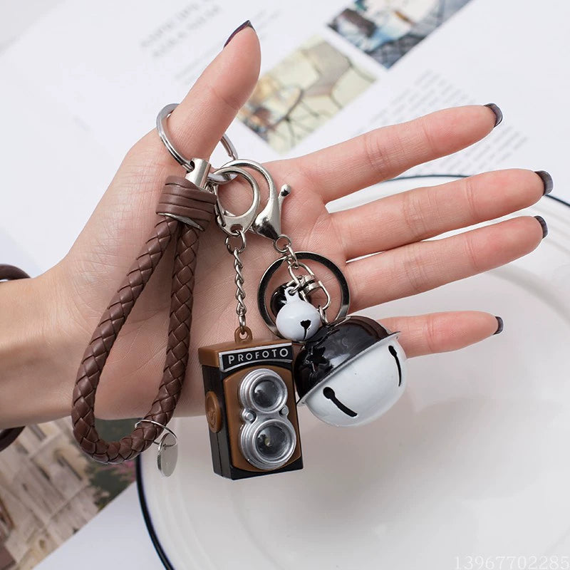 BS-034 Retro Camera Shape Pendant Sound Luminous Creative Gift Accessories SLR Camera Keychain Brown + Brown rope + black and white bell