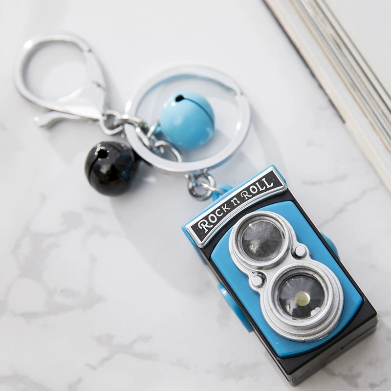 BS-034 Retro Camera Shape Pendant Sound Luminous Creative Gift Accessories SLR Camera Keychain Blue + Small Blue Bell + small black Bell