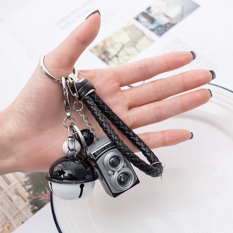 BS-034 Retro Camera Shape Pendant Sound Luminous Creative Gift Accessories SLR Camera Keychain Gray + black rope + black and white bell